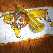 Anchor wheel and binocular on map sailing icons stock photo